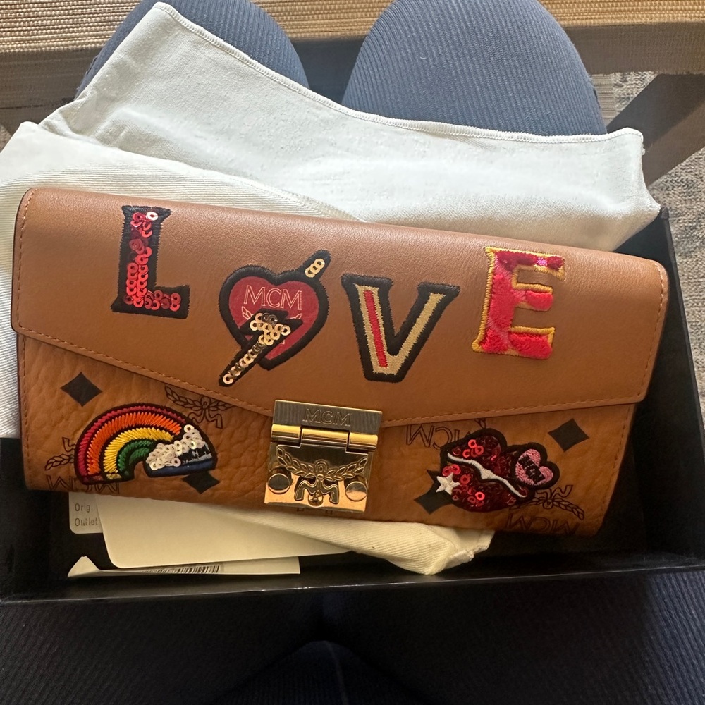 BNWT MCM Tan Embroidered Clutch with Colorful Accents